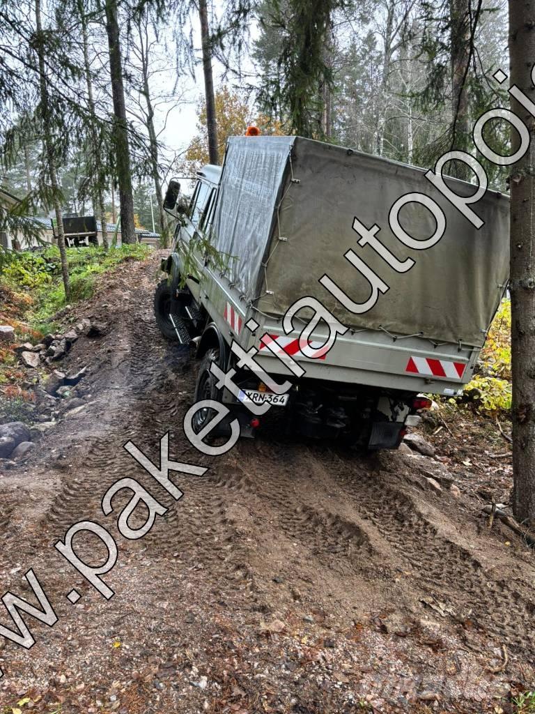 Unimog U 1250L DoKa Tautliner/curtainside trucks