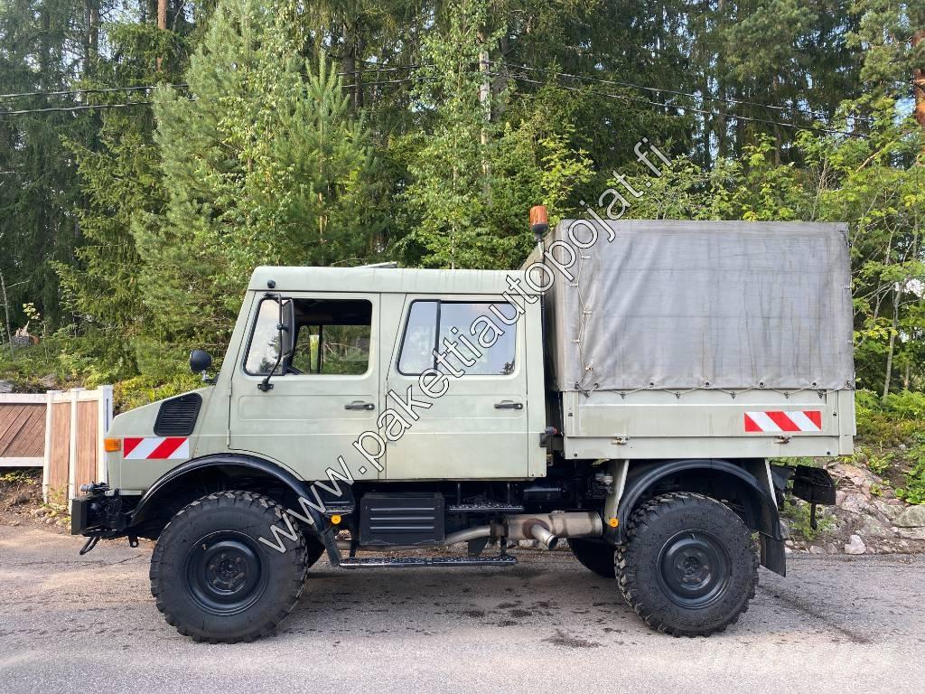 Unimog U 1250L DoKa Tautliner/curtainside trucks