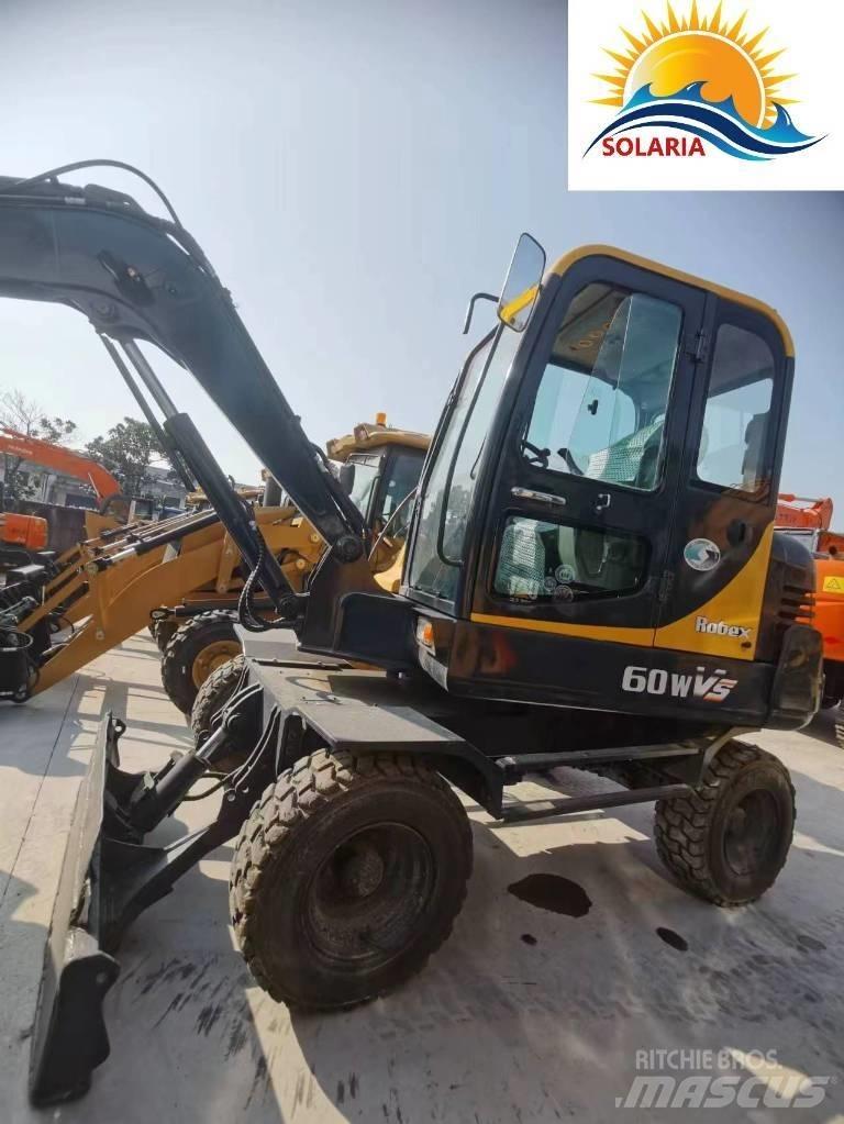 Hyundai R60W vs Mini excavators < 7t