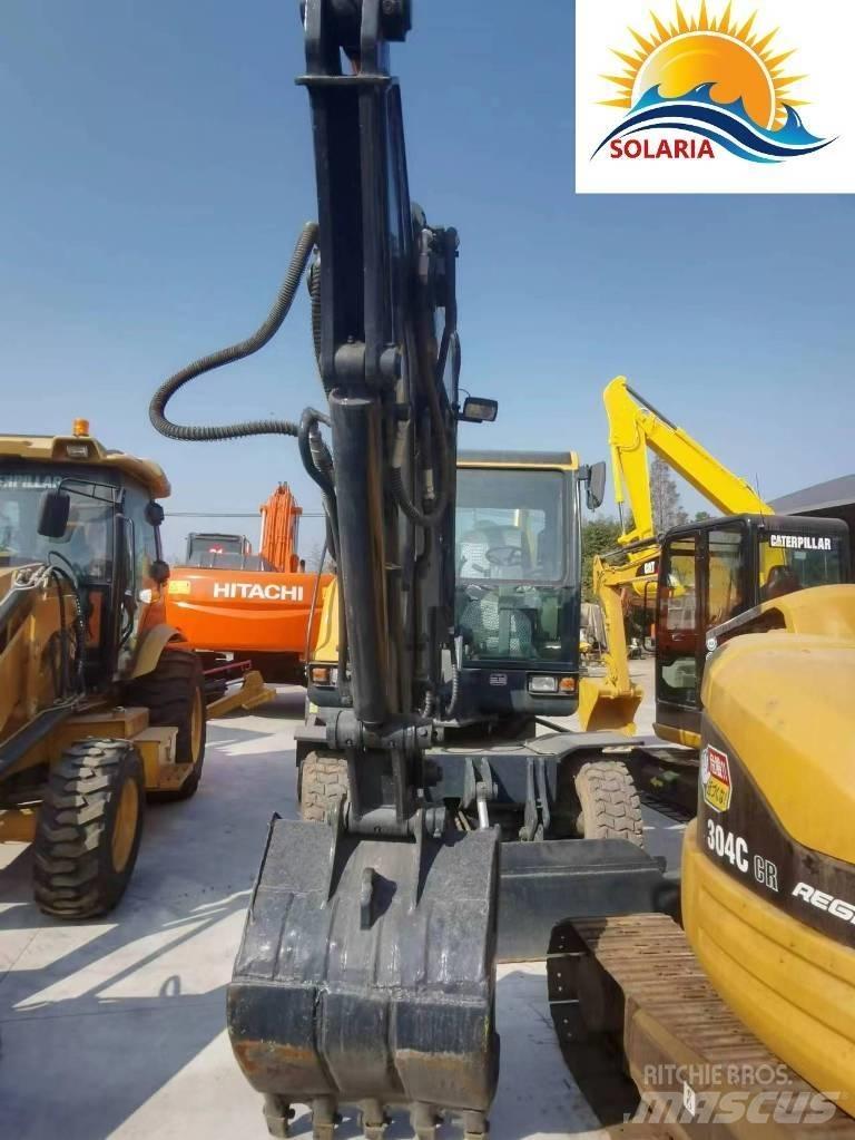 Hyundai R60W vs Mini excavators < 7t