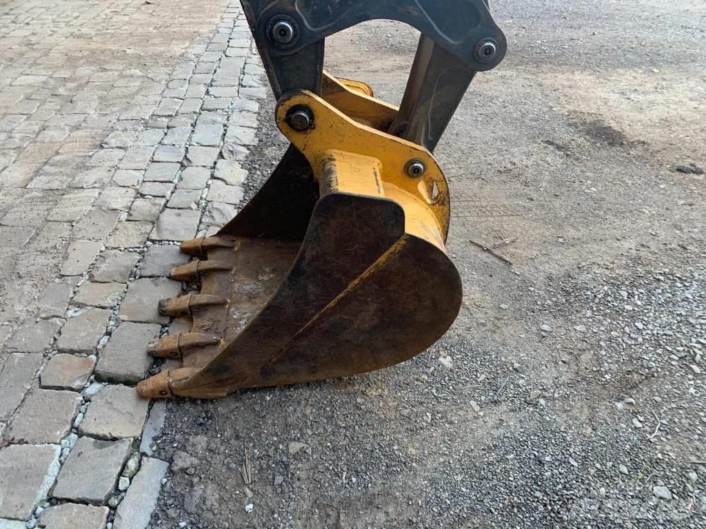 John Deere 310 L TLB's