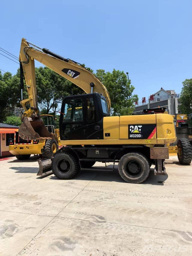 CAT M 320 Wheeled excavators