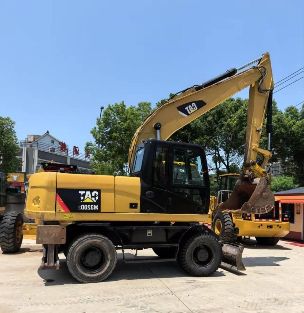 CAT M 320 Wheeled excavators
