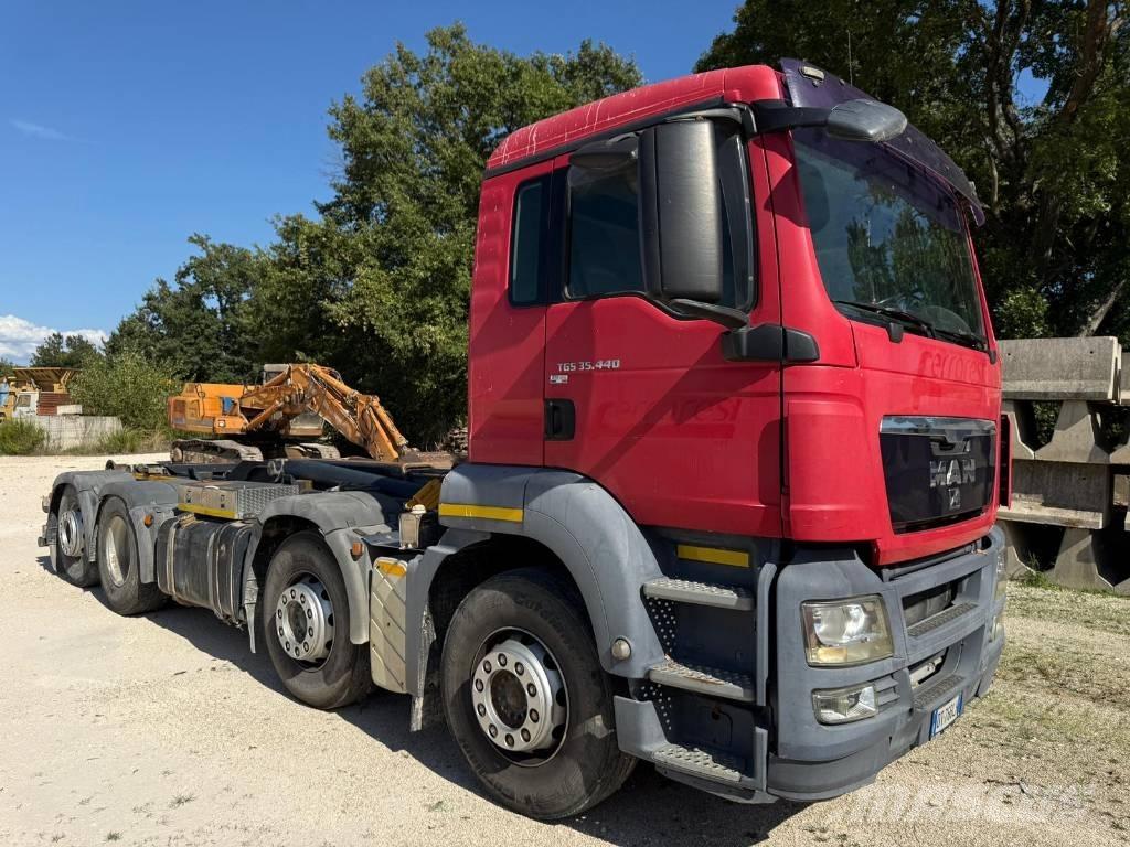 MAN 32.440 Skip loader trucks