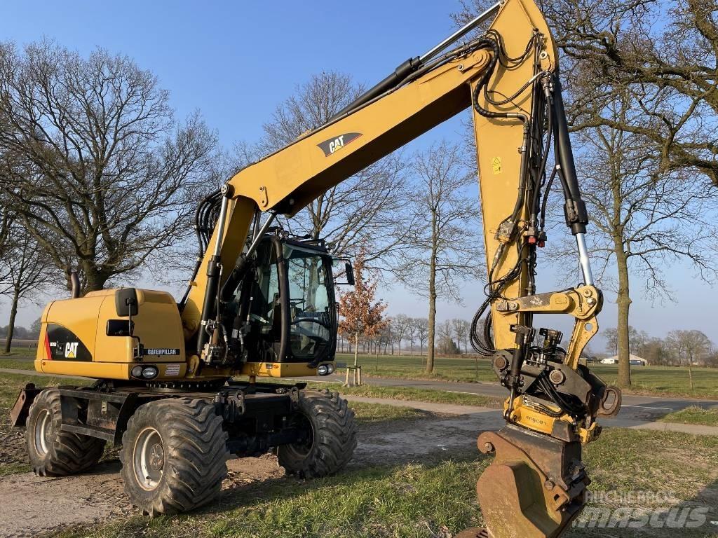 CAT M 313 D Wheeled excavators