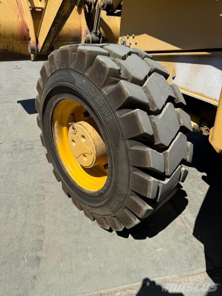 John Deere 310 G TLB's