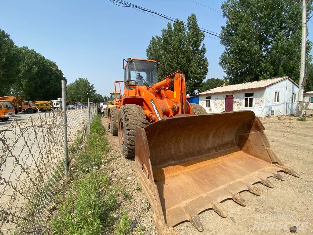 Doosan DL503 TLB's