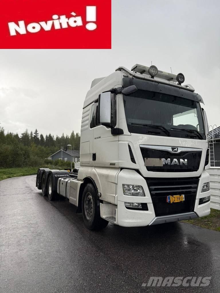 MAN TGX 32.580 Beavertail Flatbed / winch trucks