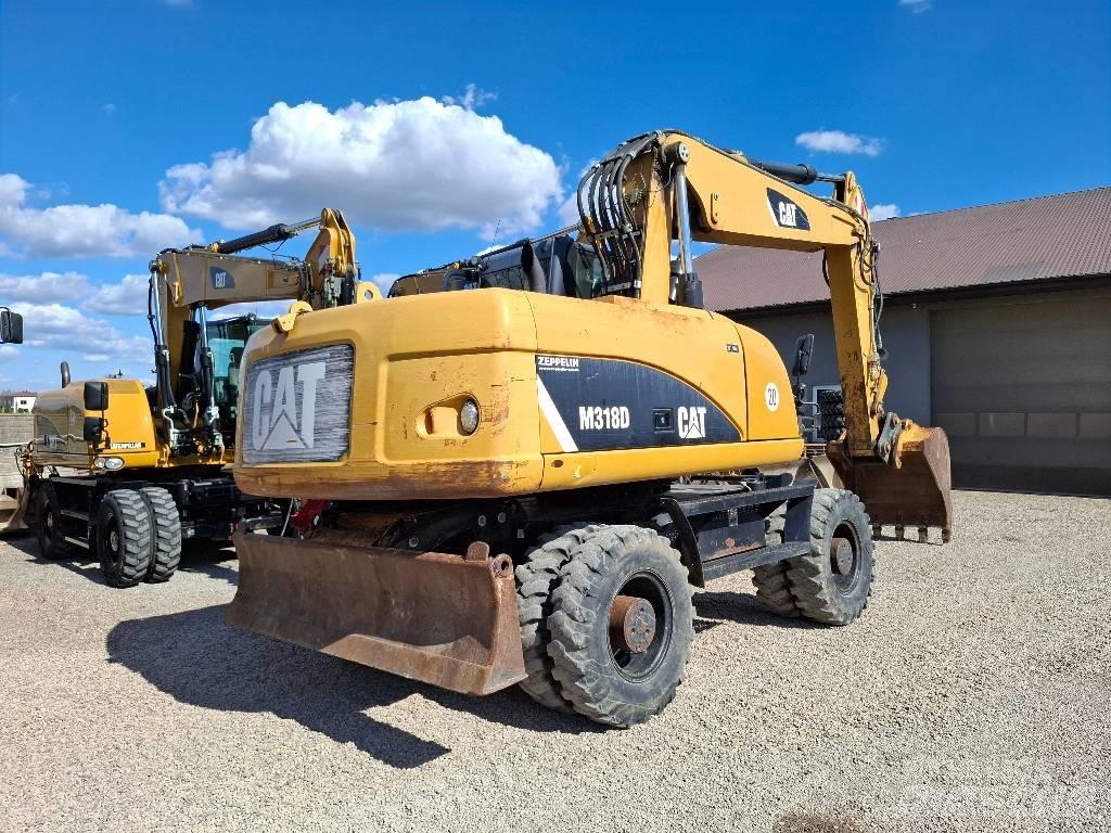CAT 318 Wheeled excavators