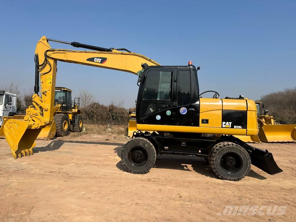 CAT M 320D Wheeled excavators