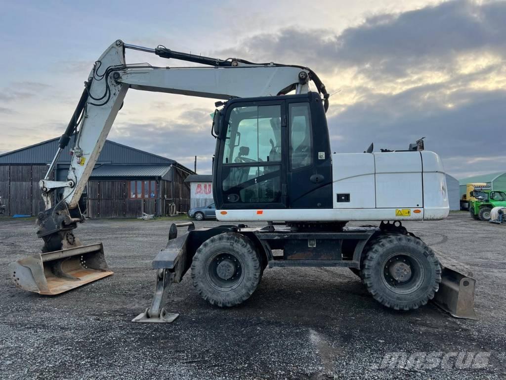 CAT M 313 D Wheeled excavators