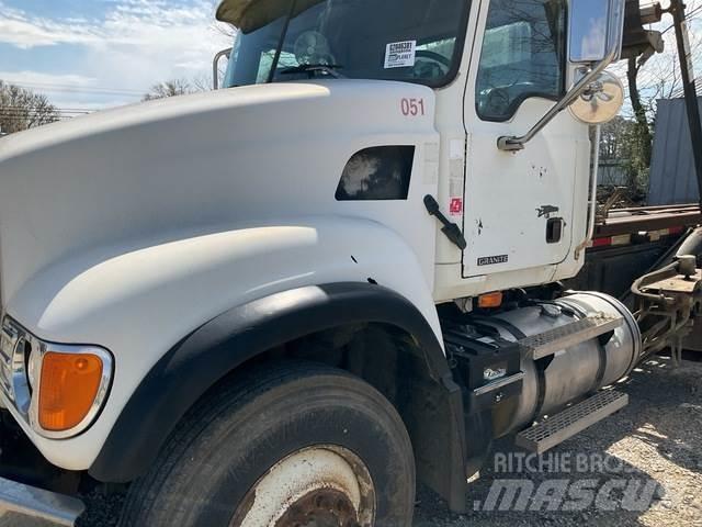 Mack CV713 Skip loader trucks