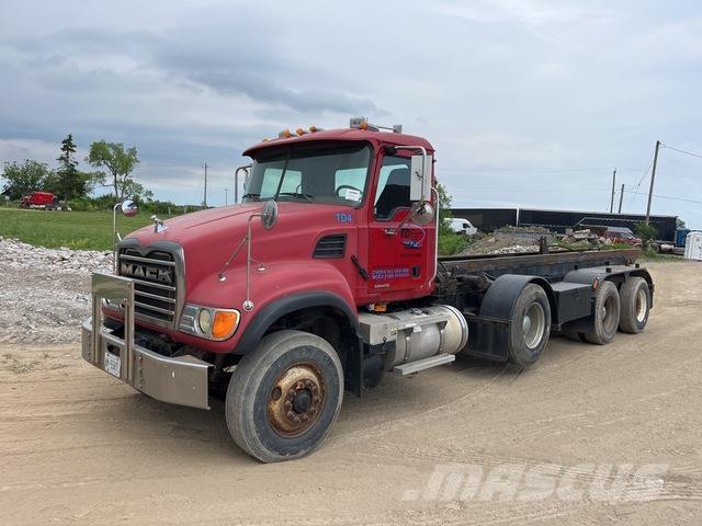 Mack CV713 Skip loader trucks