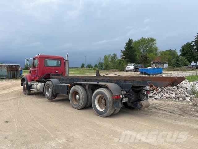 Mack CV713 Skip loader trucks