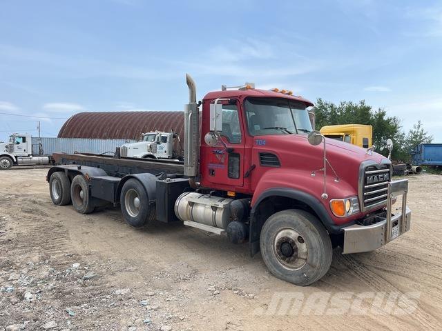 Mack CV713 Skip loader trucks