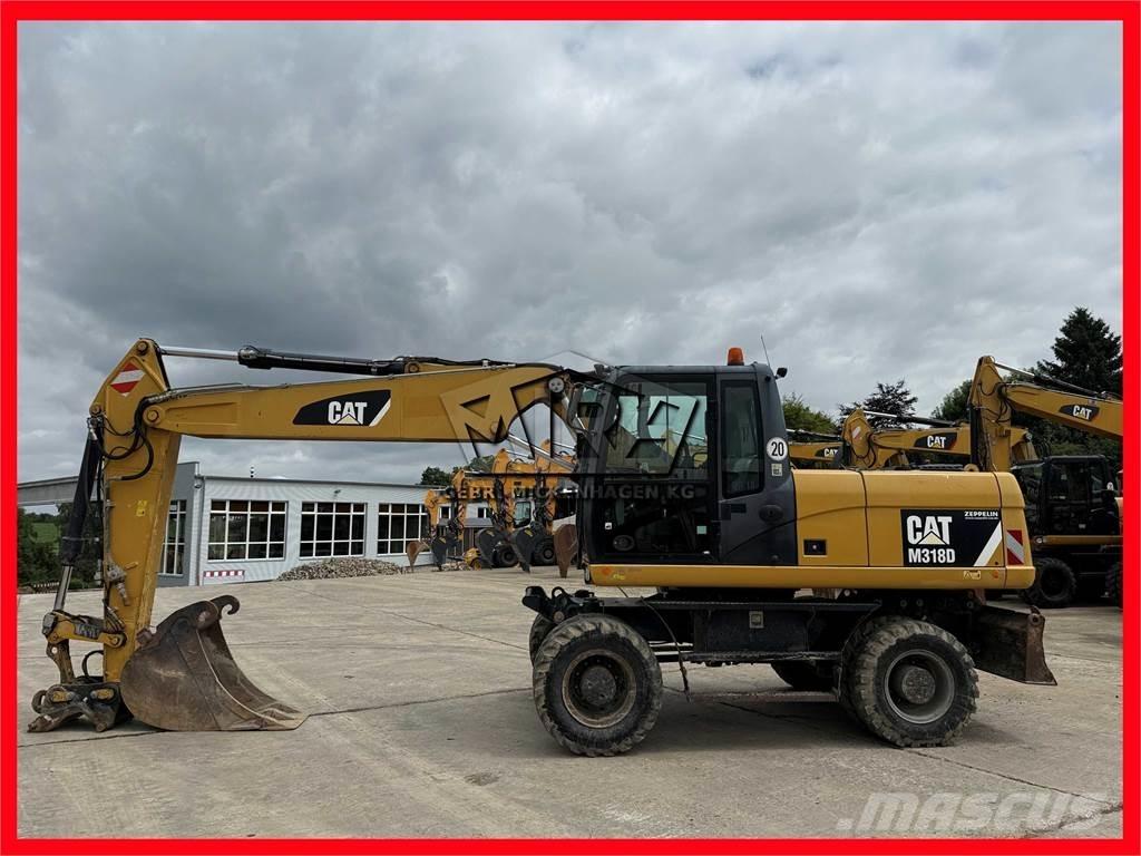 CAT M 318 D Wheeled excavators