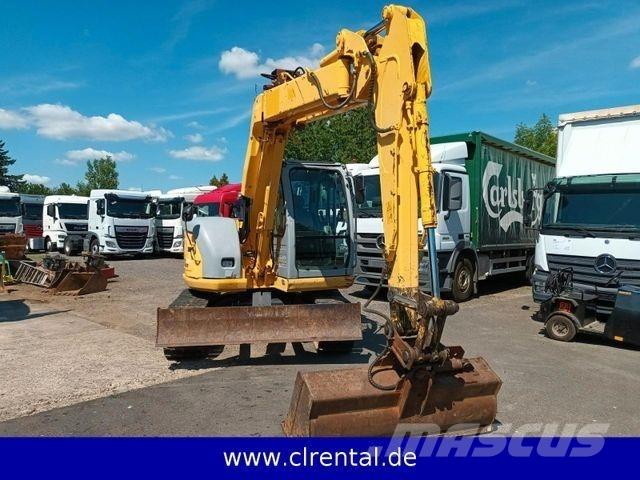 New Holland E70SR 4 TLB's
