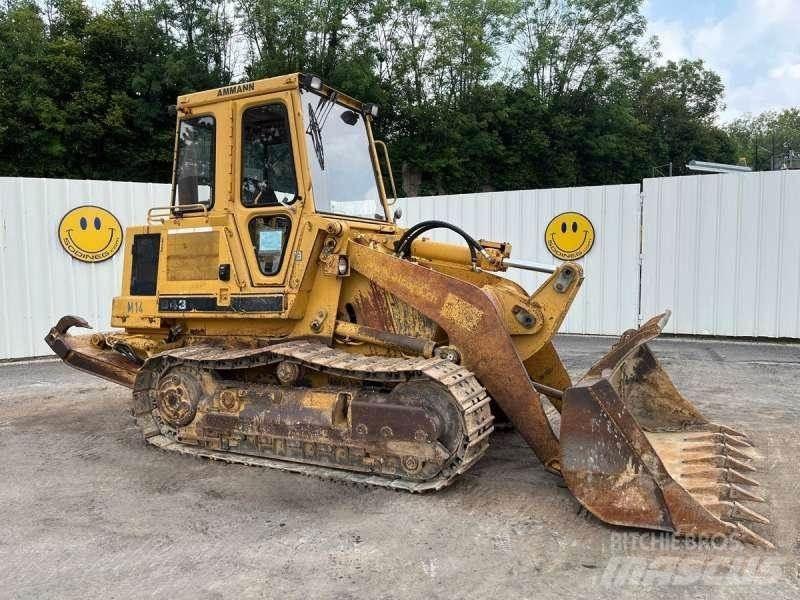 CAT 943 Crawler FEL's