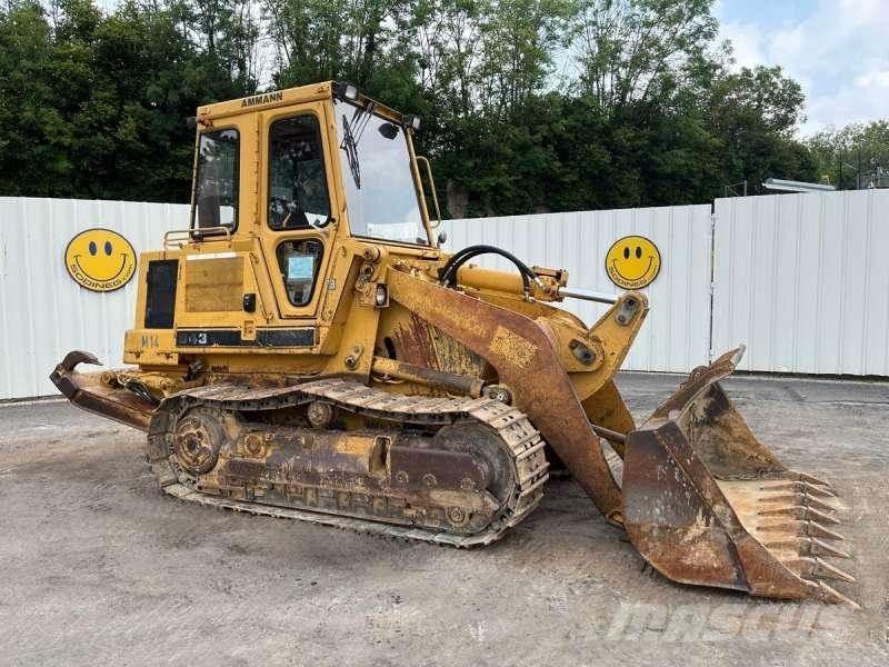 CAT 943 Crawler FEL's