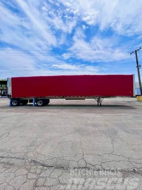 East Mfg FLATBED WITH ROLLING TARP Tautliner/curtainside trailers