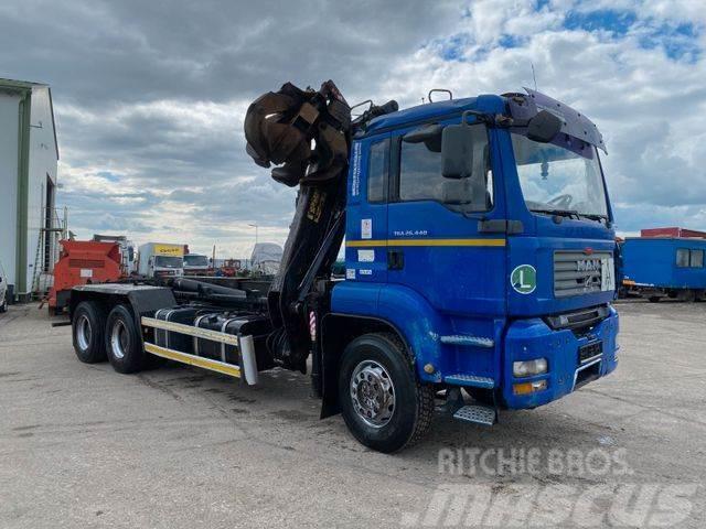 MAN TGA 26.440 6X4 for containers with crane vin 945 Hook lift trucks